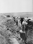 Prisoners from the Buchenwald concentration camp at forced labor building the Weimar-Buchenwald railroad line.