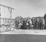 A delegation from the International Red Cross views the gallows during a tour of Buchenwald after the liberation.