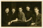 Studio portrait of the Landman family.

Pictured are Regina, Joan, Henry, Irma and Joseph.