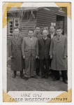 Six men pose for a picture in the Wegscheid DP camp.