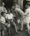 School children meet with the author Emil Ludwig in the Sosua refugee colony.