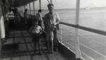 Aaron Joseph Salomon poses on the deck of the Algonquin with his sons Marcel and Alex while en route to the Dominican Republic.