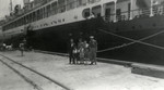 The Salomon family poses on the dock in New York prior to boarding the Algonquin which will take them to the Dominican Republic.