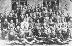 Group portrait of students in Class VII during their final semester at the Jewish public school no.121 (known as Konstadt) in Lodz.