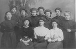 Group portrait of young women in the gymnasium for Deaf students.