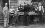 Members of a hachshara (Zionist collective) in Lithuania learn carpentry.