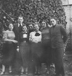 Eliezer Kaplan (right) poses with a group of friends in Lithuania.