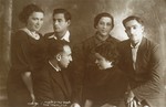 Group portrait of three couples from the kibbutz hachshara, Bemaaleh, taken on the occasion of the departure of one of its members for the army.