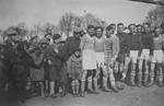 Members of a Jewish soccer team pose with family and friends in Gargzdai, Lithuania.