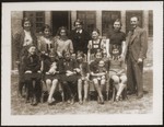 A school class of Jewish refugee children, including Hannelore Mansbacher (seated 1st row, third from left), at Transition Upper school on Kinchow Road in Shanghai.