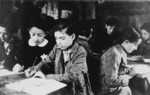 Children studying in a clandestine school in the Kovno ghetto.