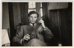 Close-up portrait of David Arben, a violinist and youngest member of the Ex-Concentration Camp Orchestra in Saint-Ottilien.