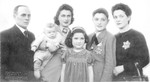 Portrait of a French Jewish family wearing Jewish stars.