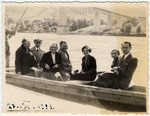The Litman family poses in a boat in prewar Poland.