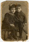 Studio portrait of Bella and Izya Khanuk, both of whom were murdered in an Aktion 1942.