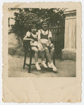 Miriam and Hanka Wertheimer share a garden bench.