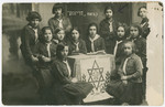 Group portrait of teenage girls in a Shomer Hatzair group in Jurbarkas, Lithuania.