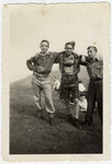 Group portrait of three "Buchenwald Boys", teenage survivors of Buchenwald, in a children's home in Switzerland.