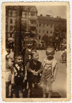 Hungarian Jewish children gather on a street in Budapest.