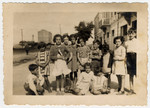 German and Austrian refugee children pose with Albanian children shortly after their arrival.
