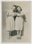 Miriam Wattenberg (Mary Berg) and her friend Mickie Rubin pose together in the Warsaw ghetto.