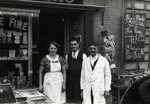 Elizabet and Josef Cheraki pose in front of their grocery store in Toulouse.