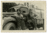 David Levi leans against the side of a truck while serving in the Jewish Brigade in Italy.