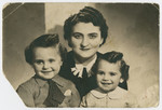 Studio portrait of Frymetta Hochglaube with her two children, Jacques (left) and Nestor (right), taken shortly before going into hiding.