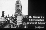 2nd slide from a Hitler Youth slideshow about the aftermath of WWI, Versailles, how it was overcome and the rise of Nazism.