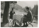 Vilma and Kurt Grunwald enjoy a meal in the countryside.