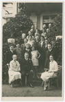 Group family portrait taken to celebrate the engagement of Vilma Eisenstein and Kurt Grunwald.