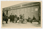 A group of Buchnewald survivors wait to be transported to another location after the camp was liberated.