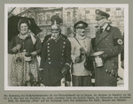 Group portrait of men and women dressed as typical Berlin character types.
