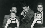 Group portrait of Uncle Chaim Finci, his twin nephews and two other men..