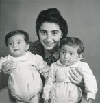 Ella (Kabilio) Finci holds her twin sons, Shmuel and Avraham.