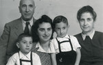 Studio portrait of the Kabillo Finci family.

Pictured are Ella (Kabilio) Finci, her twin sons, Shmuel and Avraham Finci, and her parents, Albert and Blanka Kabilio.