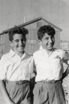 Close-up portrait  of 12 year old twin brothers Shmuel and Avraham Finci standing at the Talpiot Immigration Center in Jerusalem.