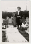 Klara and Helga Schneider visit the grave of their mother/grandmother, Rachela Davidson.