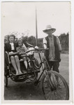Klara and Helga Schneider take a bicycle powered rickshaw ride in Shanghai.