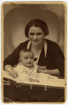 Studio portrait of Laura and her infant son Marcel.