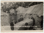 Survivors from Kozienice exhume and rebury victims killed by the Nazis.