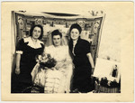 Two women sit in attendance with a bride.  

Shulamit Perlmutter is seated on the far right.
