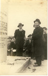 Joseph Rosensaft (left) and Rabbi Joel Halpern preside over the dedication of a Holocaust memorial in Bergen-Belsen.