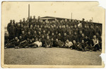 Group portrait of prisoners in the Elsterhorst prisoner of war camp, Stalag IV-A.