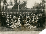 A photo of an all men's mandolin orchestra.

Feivel Frankfowicz is pictured in the middle row, third person from the right.