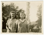 Two girls pose at the children's home of Chateau de la Hille.