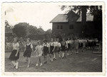 Young boys and girls walk in a line at the Home General Bernheim in Zuen, Belgium, a suburb of Brussels.