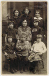 Portrait of Rifkeh-Rochel Orlinsky surrounded by her grandchildren.