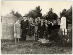 Survivors from Zhetel and non-Jewish friends visit a memorial to the 3000 Jewish victims of the Holocaust from Zhetel in the Jewish cemetery.