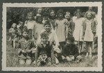 Group portrait of elementary age children in a Zionist children's home in Switzerland.